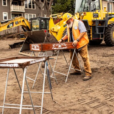 Wayne sifting fossils